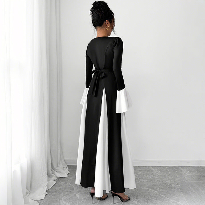 Ladies evening dress with fitted corset top, long sleeves and contrasting flounce cuffs Mune Fashion