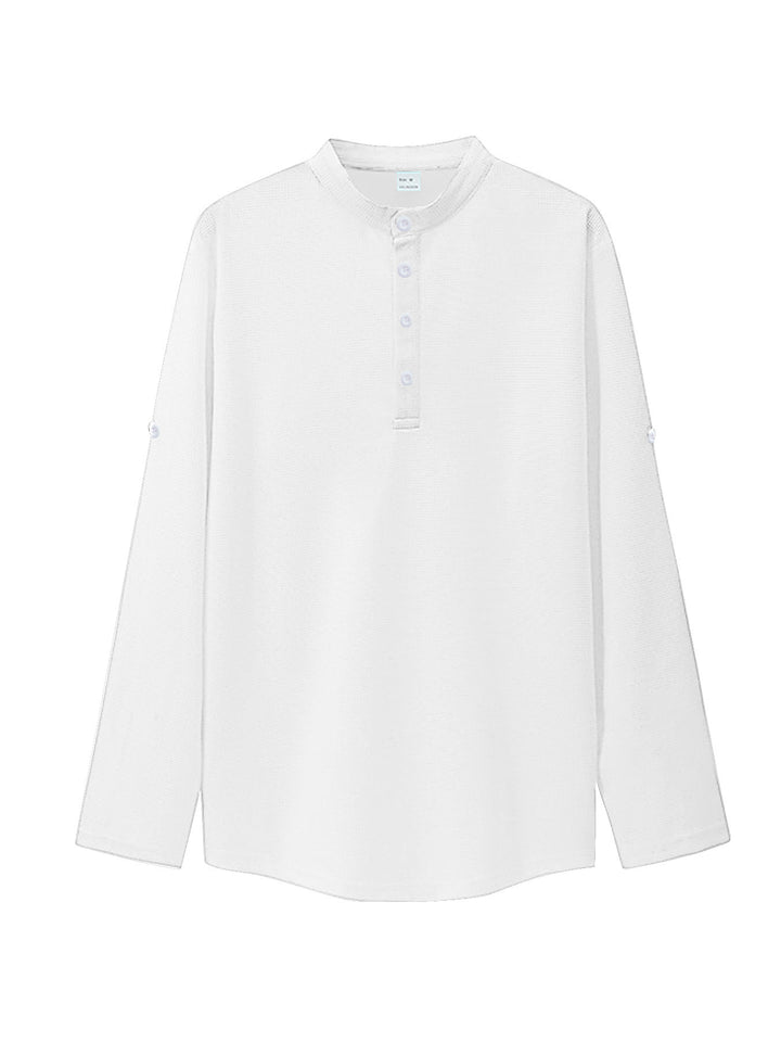 Women's oversized long sleeve Henley with stand-up collar waffle texture and sleeve fastening Mune Fashion