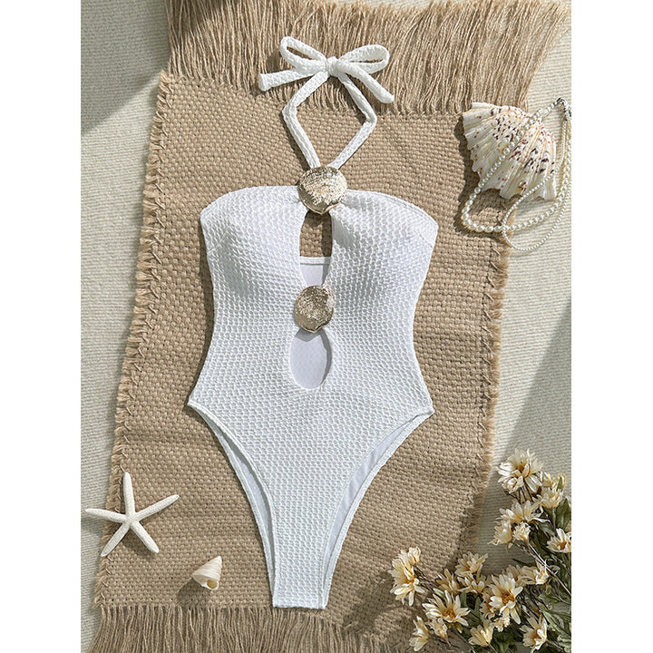 Women's one-piece swimsuit with sophisticated cut-out design and golden accents Mune Fashion