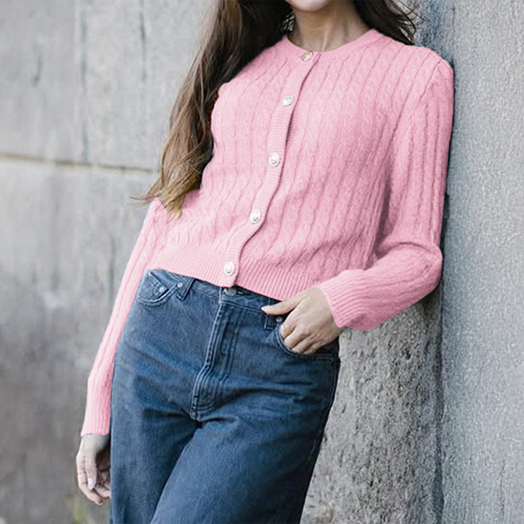 Women’s cropped cable knit cardigan with decorative medallion buttons and round neckline Mune Fashion