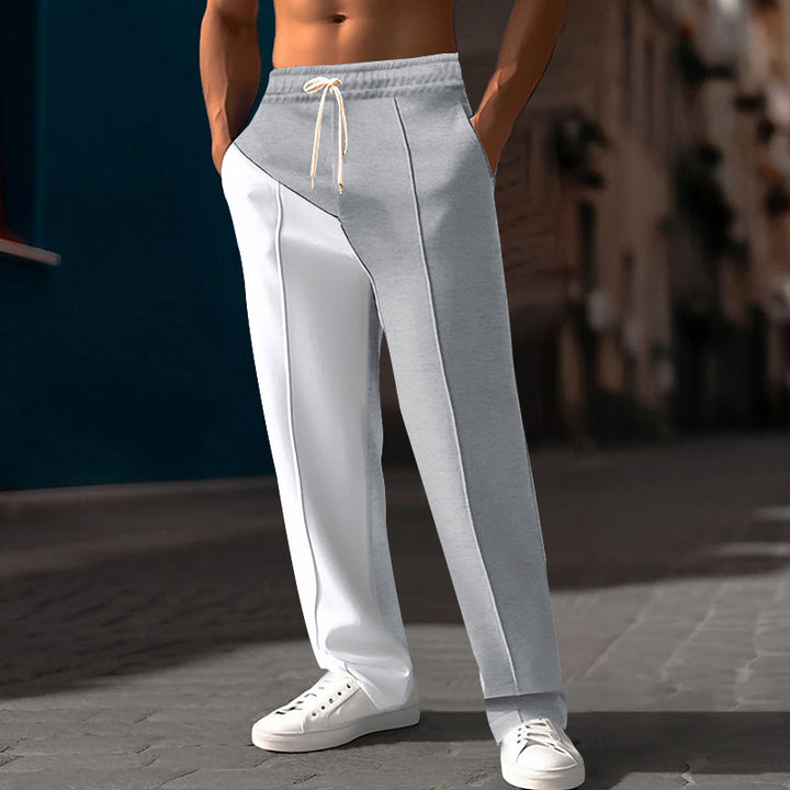Men's casual jogging pants with asymmetric cut and elastic waistband Mune Fashion