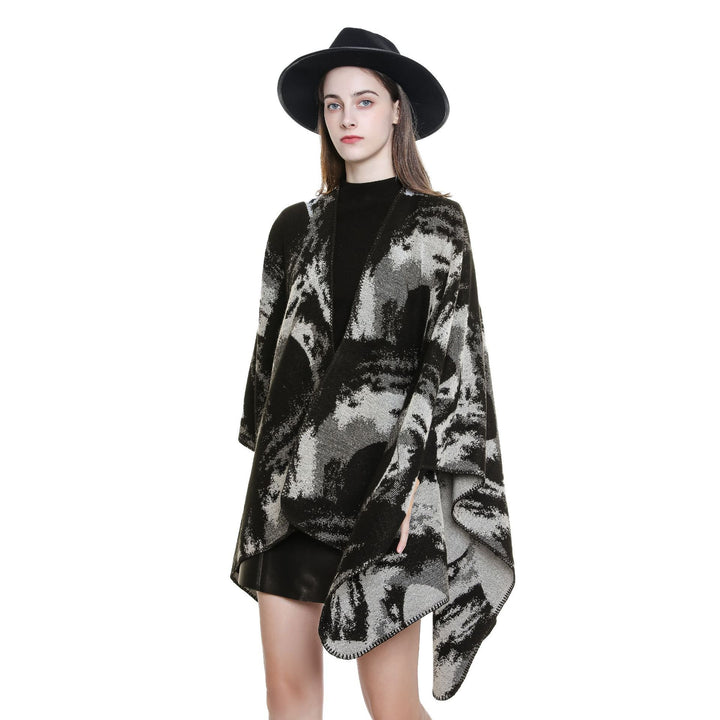 Ladies oversized jacquard cape made of wool blend with graphic watercolor pattern and overlock edge Mune Fashion