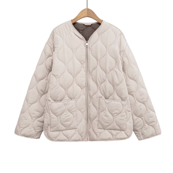 Women's non-quilted oversized quilted jacket with round neckline, full-length zipper, and patch pockets Mune Fashion