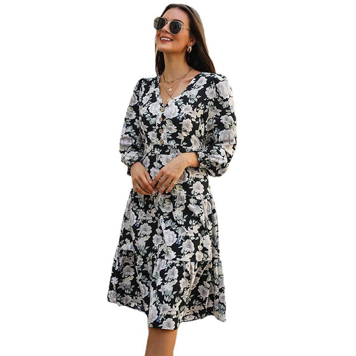 Women's midi dress with tiered skirt, V-neck, waist seam and gathered sleeve cuffs Mune Fashion