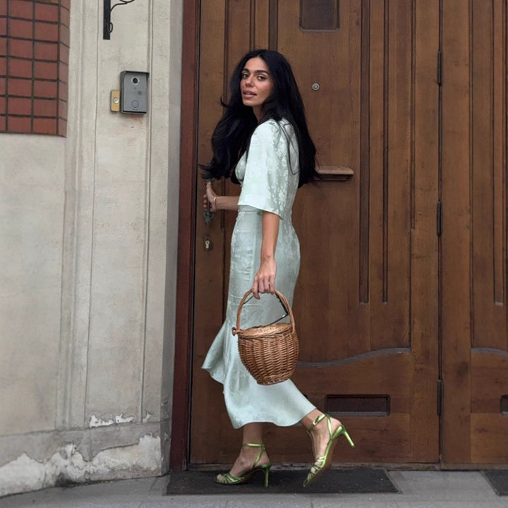 Women's mid dress made of jacquard with V-neck, decorative button placket, and front slit Mune Fashion