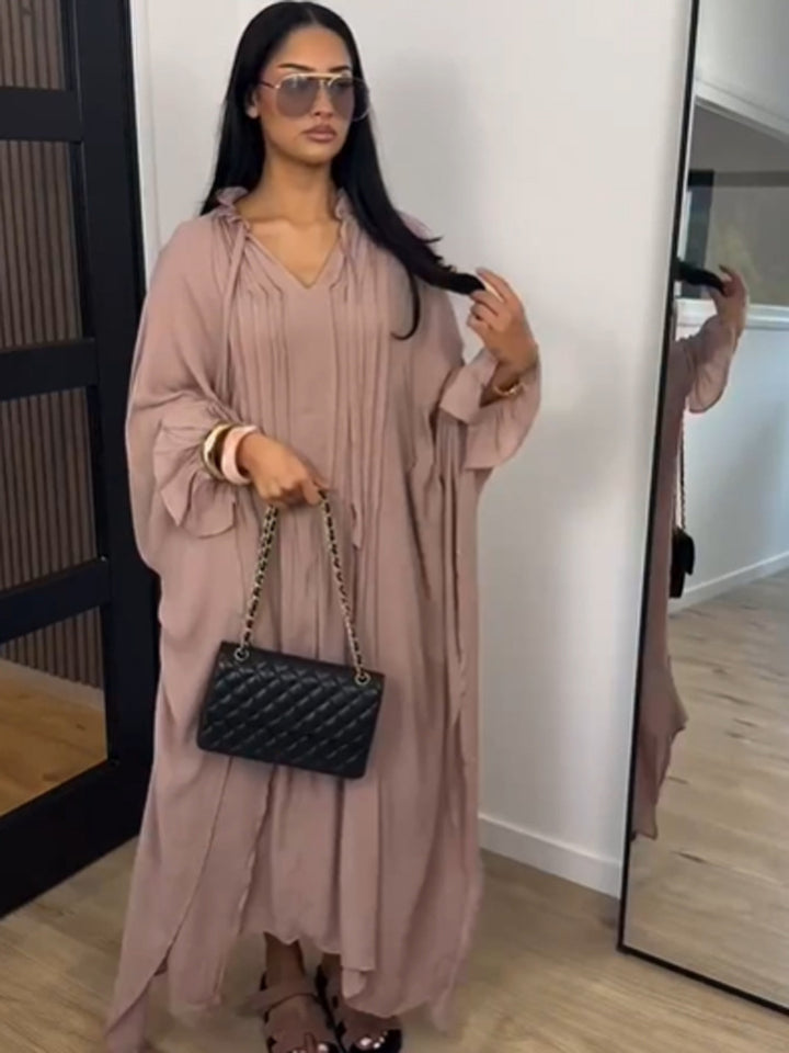Women's maxi dress in kaftan style with ruffled collar, tie straps, and voluminous sleeves Mune Fashion