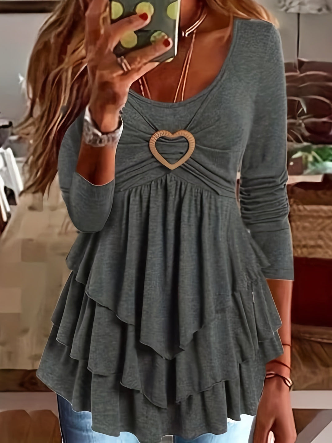 Women's layered look tunic with heart-shaped decorative buckle and gathered neckline