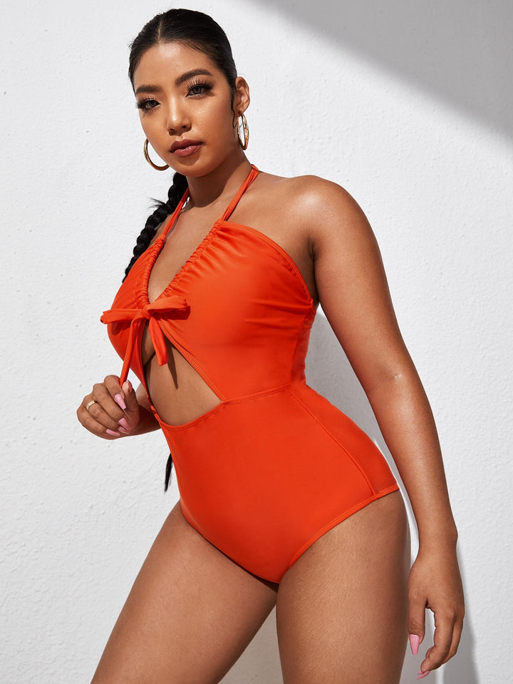 Women's one-piece swimsuit with playful knot and side cut-outs Mune Fashion