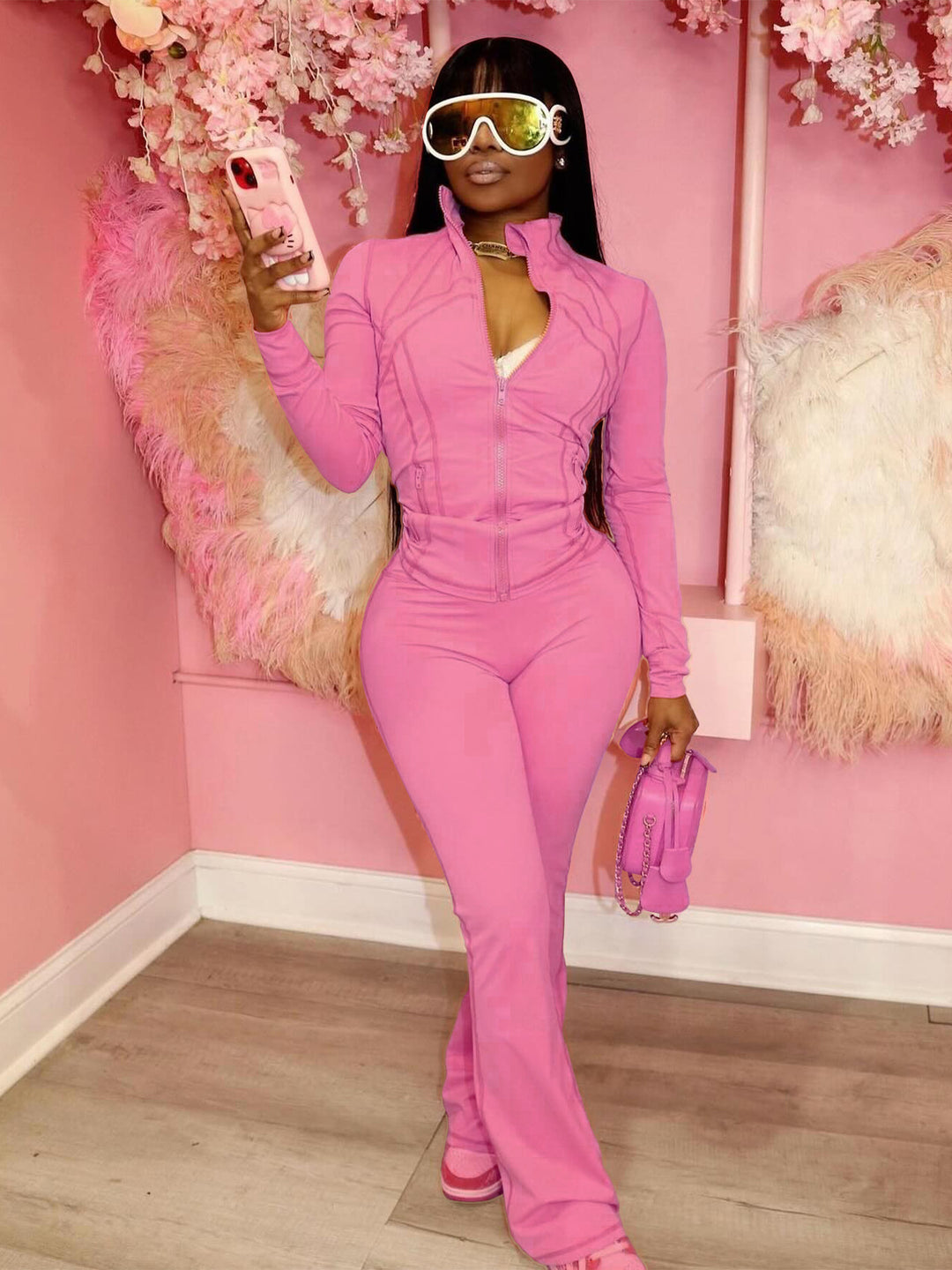 Women's figure-hugging tracksuit with zipper, high waist and flared leg Mune Fashion