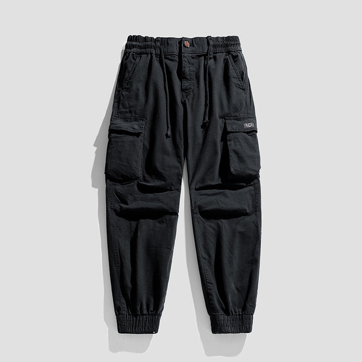 Men's Robust Cargo Jogging Pants in Utility Style with Drawstring Waistband, Flap Pockets, and Knee Panels Mune Fashion