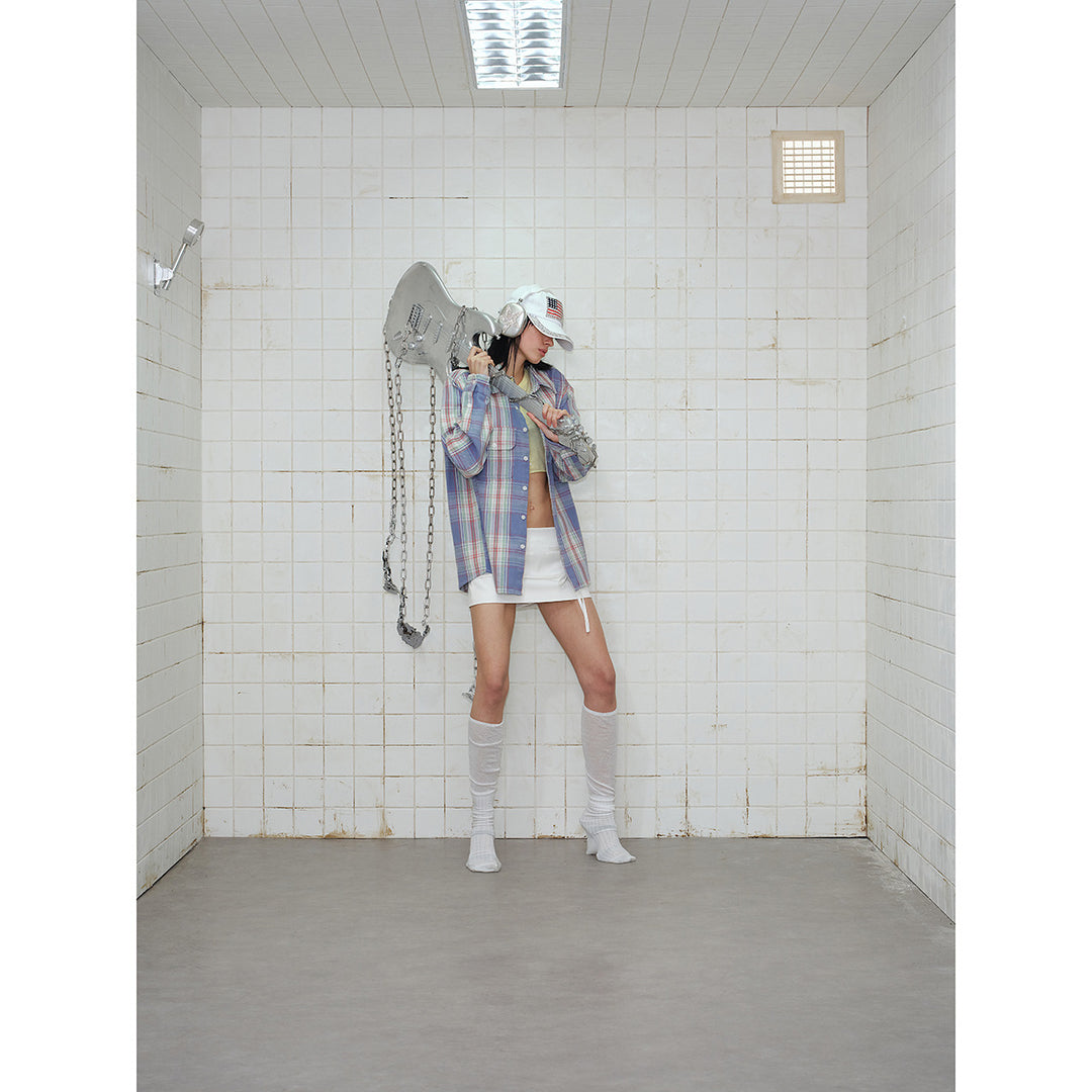 Unisex check shirt jacket in oversized cut with flap pockets and sleeve patch Mune Fashion