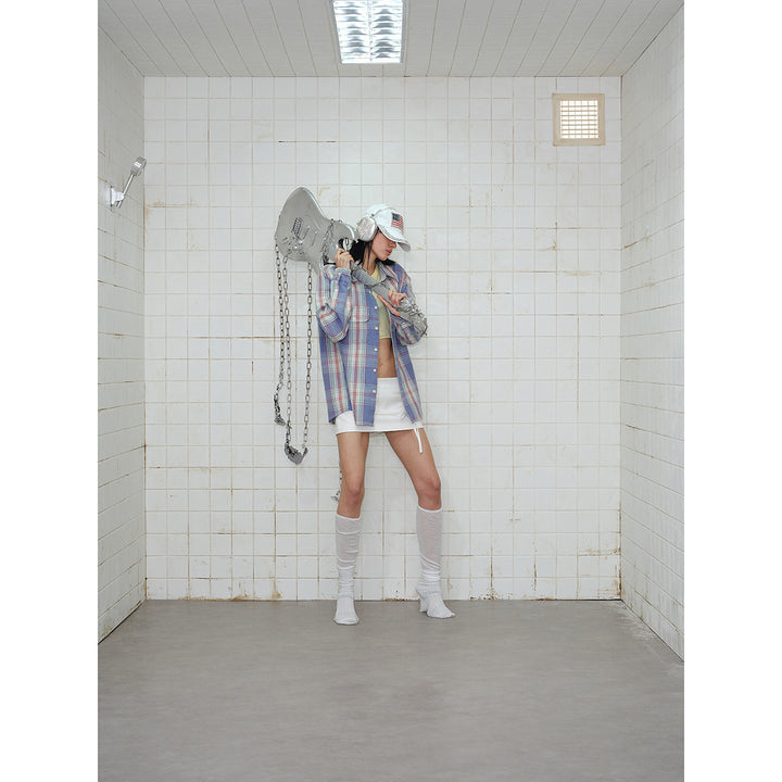Unisex check shirt jacket in oversized cut with flap pockets and sleeve patch Mune Fashion