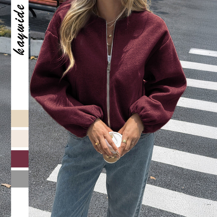 Women's short cozy bomber jacket with continuous zipper, elastic hem, and concealed pockets Mune Fashion