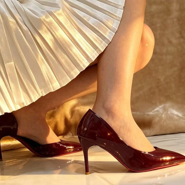 Ladies pointed toe high heels in patent look with narrow stiletto and contrasting glossy sole Mune Fashion