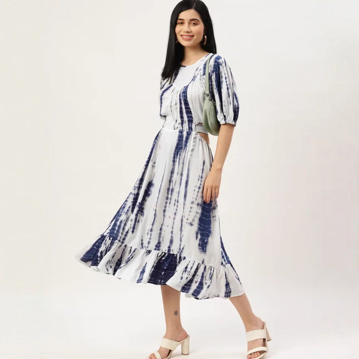 Women’s midi dress with tie-dye print, fitted cut, side cut-out, and ruffled hem.