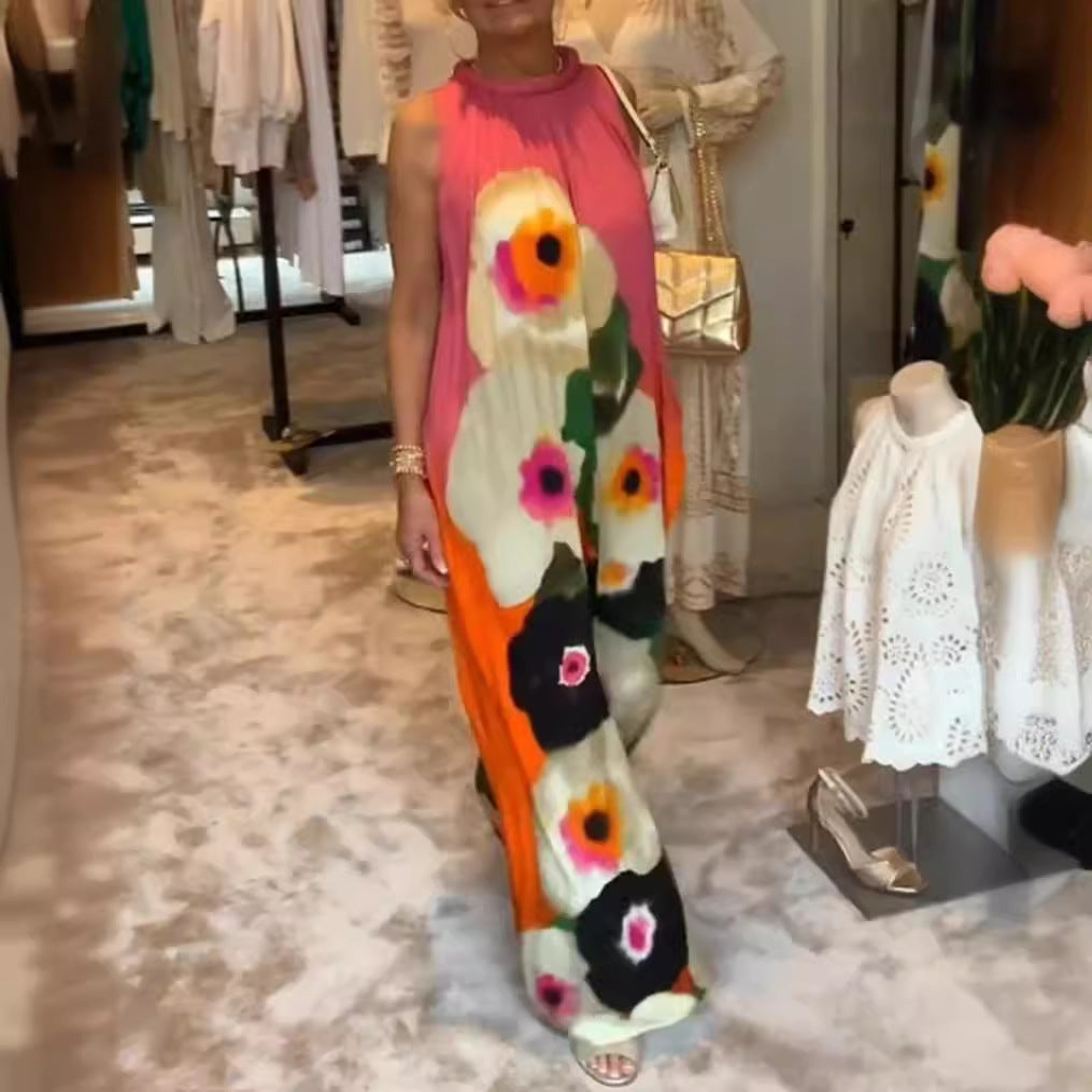Women's sleeveless maxi dress with ruffled high collar, wide palazzo cut, and large floral print Mune Fashion