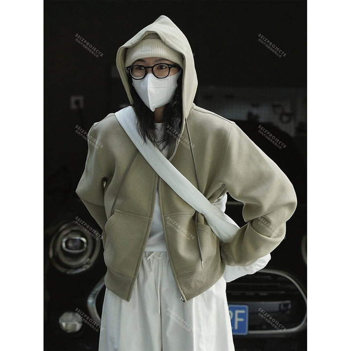 Women short cut hooded zip jacket with dropped shoulder and kangaroo pockets Mune Fashion