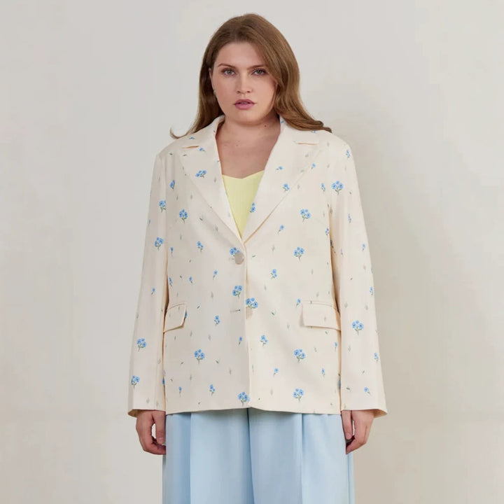 Women’s boxy cut blazer with floral all-over print and flap pockets Mune Fashion