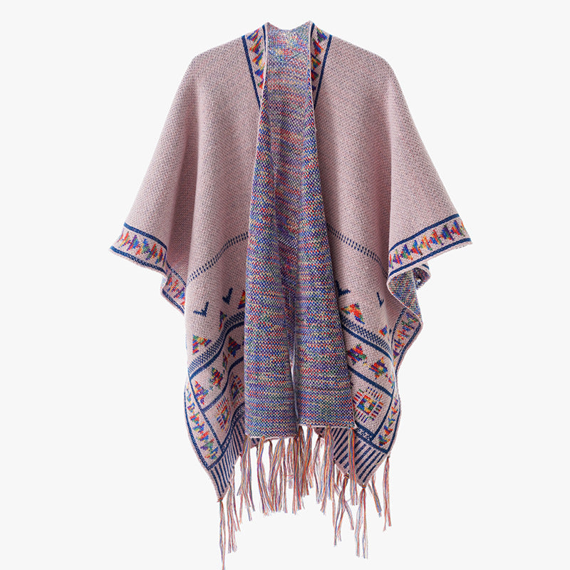 Women's chunky knit poncho with woven ethnic trim and fringes Mune Fashion