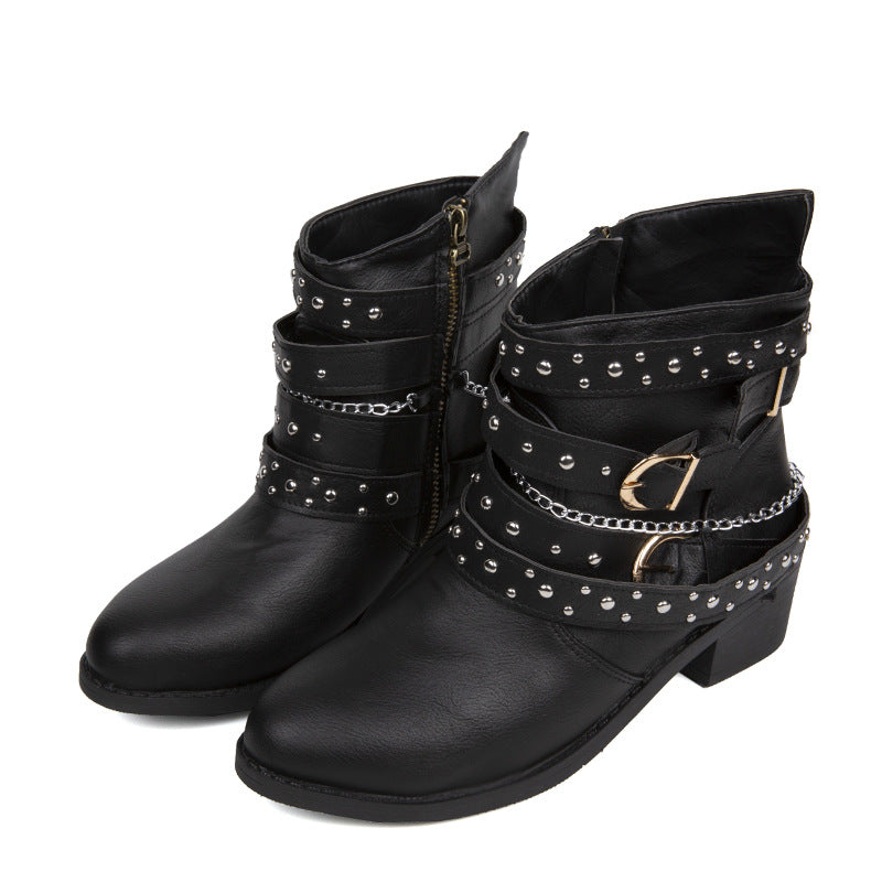 Women's ankle-height biker ankle boots with studded strap, chain and buckle details Mune Fashion
