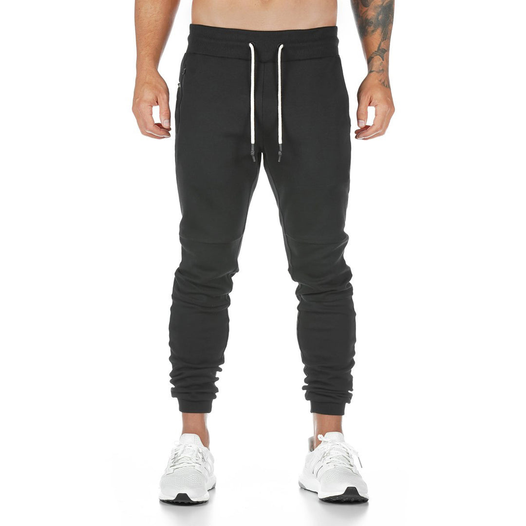 Men's narrow-cut joggers with ribbed waistband, zip pocket, and knee darts Mune Fashion