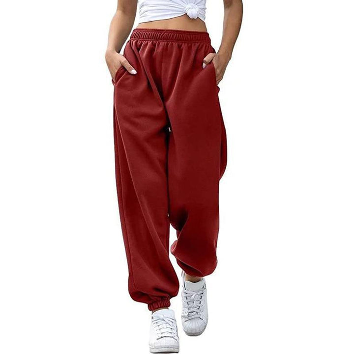 Women's Baggy Sweatpants in Retro Look with high comfort waistband, low drop, side pockets, and elastic ankle cuffs Mune Fashion