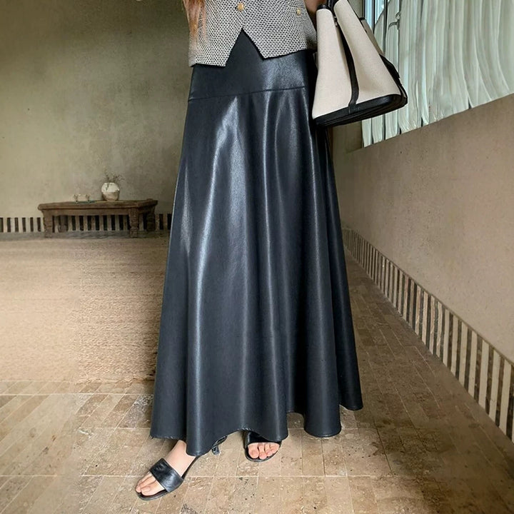 Women's midi skirt made of faux leather with a high waist and flared A-line Mune Fashion