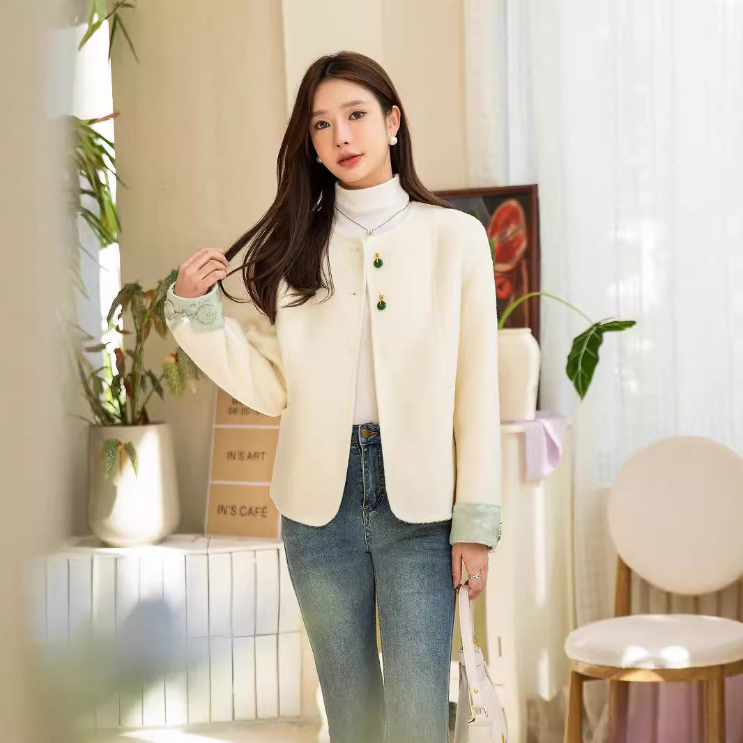 Women's short jacket with stand-up collar, pearl buttons, and contrasting cuffs Mune Fashion