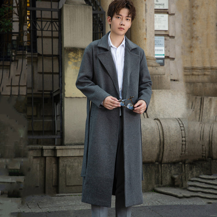 Men's long cut wool coat in minimalist design with generous shawl collar and concealed button placket Mune Fashion