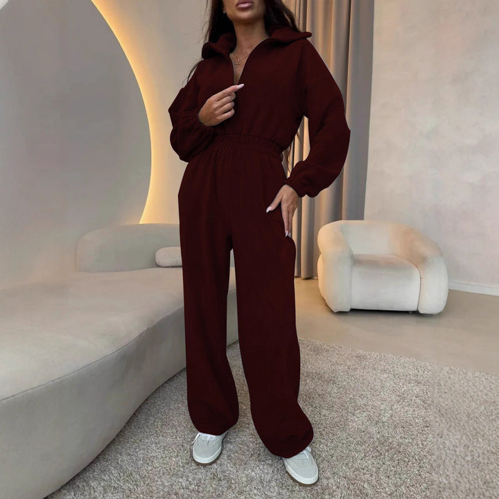 Women's elegant lounge overall with elastic waistband, stand collar, zipper and wide leg.