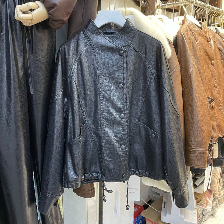 Women Short Leather Jacket with textured grain, stand-up collar, and drawstring waistband Mune Fashion