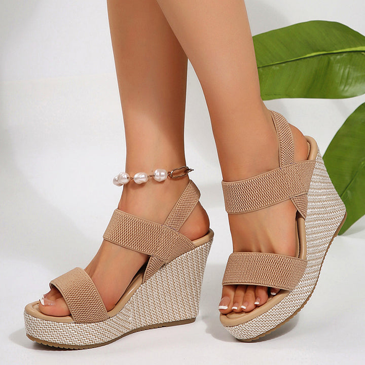 Women's wedge sandals with elastic textile straps and braided straw platform Mune Fashion