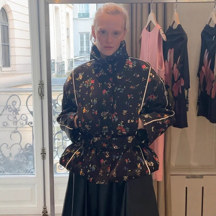 Women's short cut quilted blouson jacket with high standing collar, piping and floral all-over print Mune Fashion