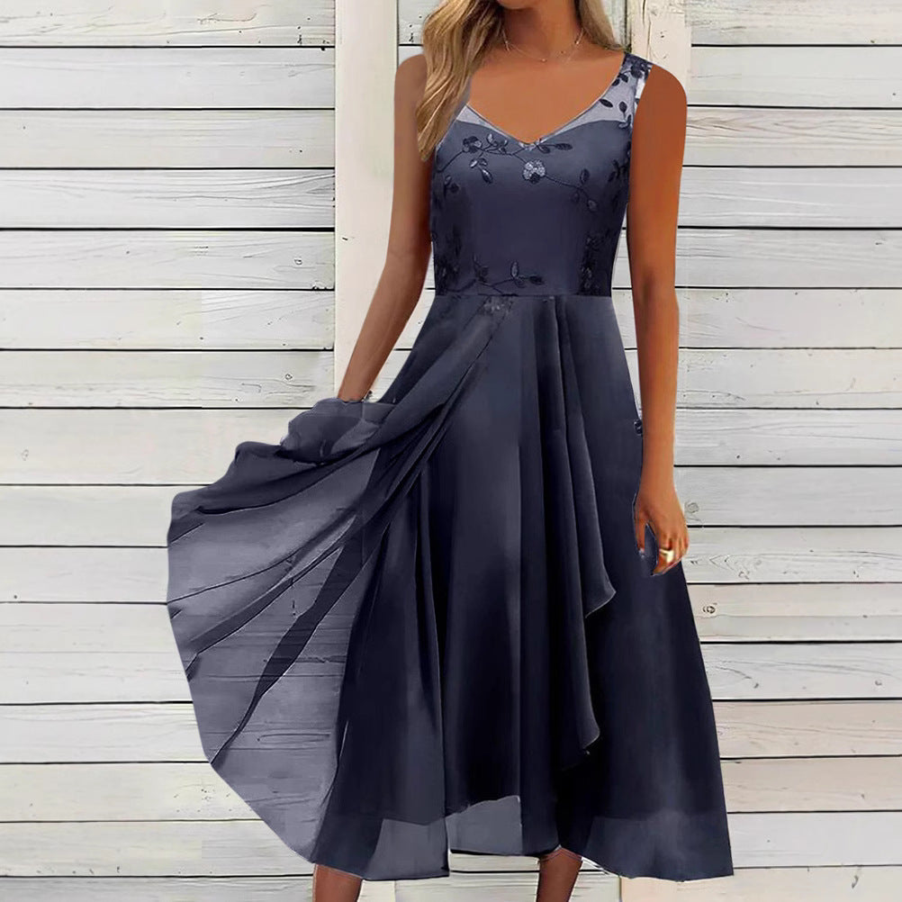 Women A-line chiffon dress with floral embroidered bodice, V-neck, draped godet swing and concealed side pockets Mune Fashion
