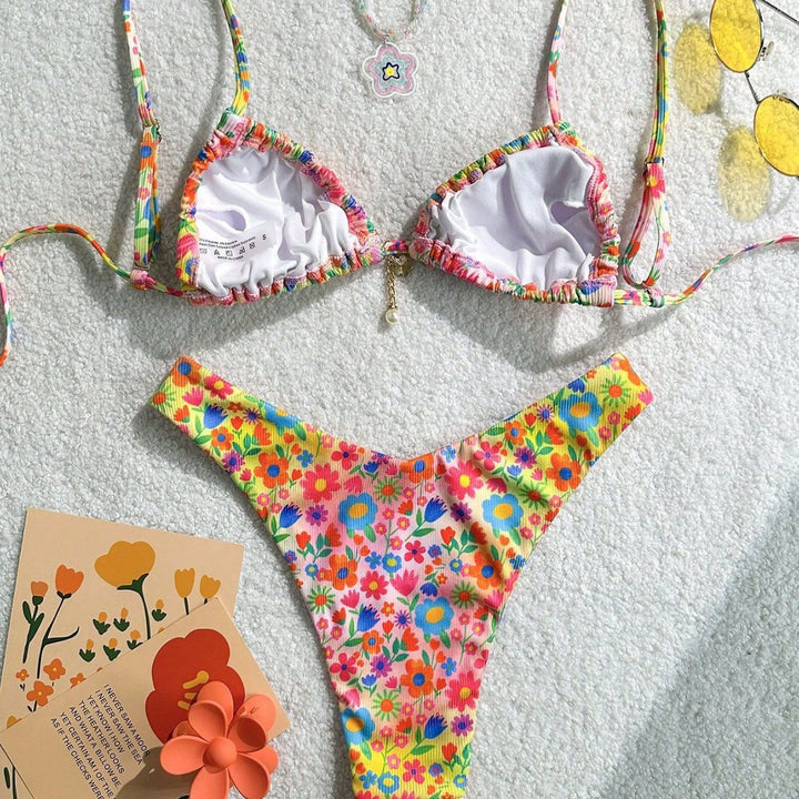 Women's triangle bikini with colorful floral design and fine ruffle details Mune Fashion