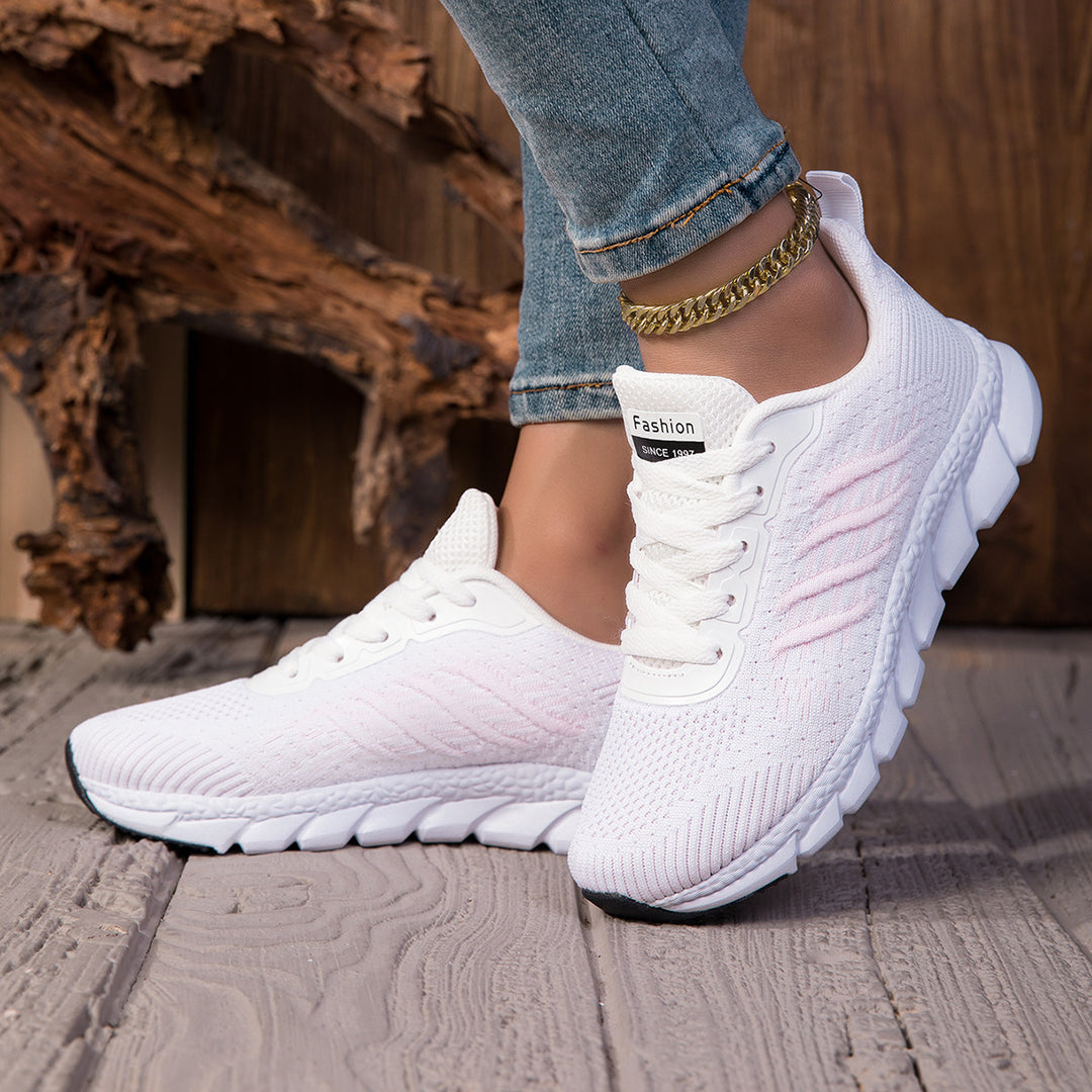 Women's knitted slip-on sneakers with elastic shaft, decorative lacing, and segmented cushioning sole Mune Fashion