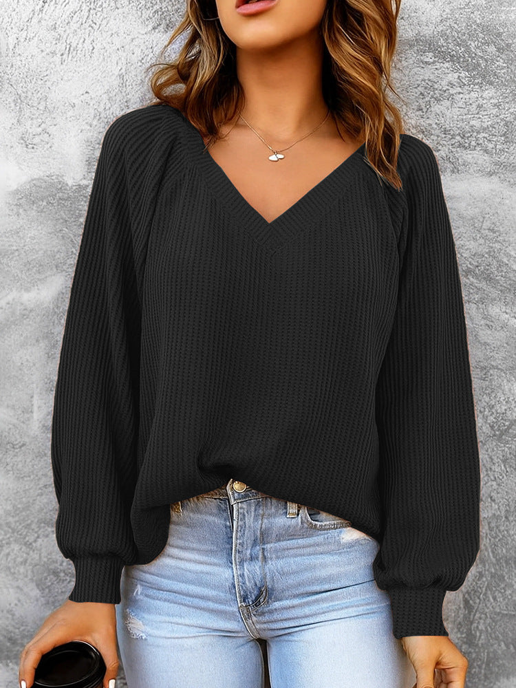 Women's fine structure knit sweater with V-neck, balloon sleeves, and ribbed cuffs Mune Fashion