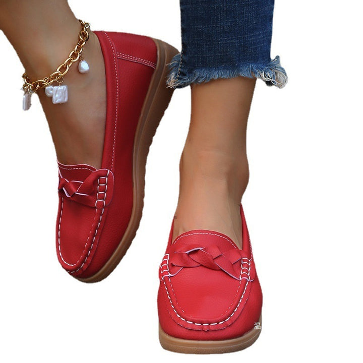Ladies braided comfort moccasin with contrast stitching, padded memory insole, and flexible rubber profile Mune Fashion