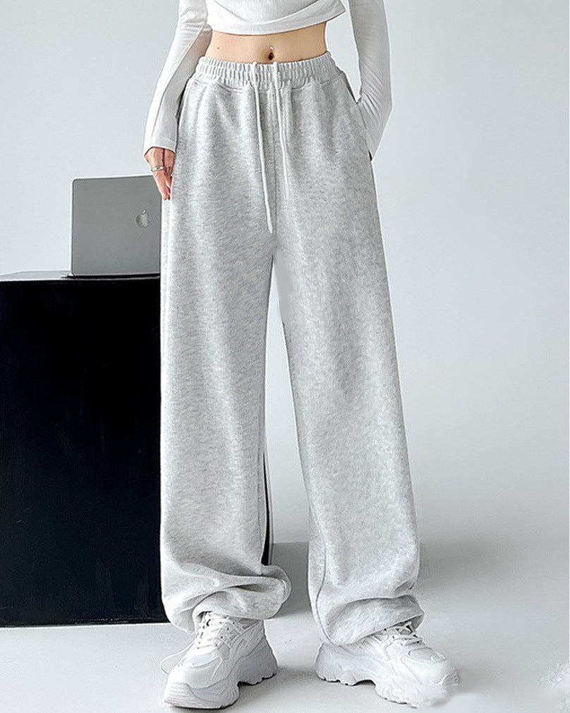 Ladies Nan extra wide palazzo sweatpants with high comfort waistband, side pockets, slit at hem and drawstring Mune Fashion