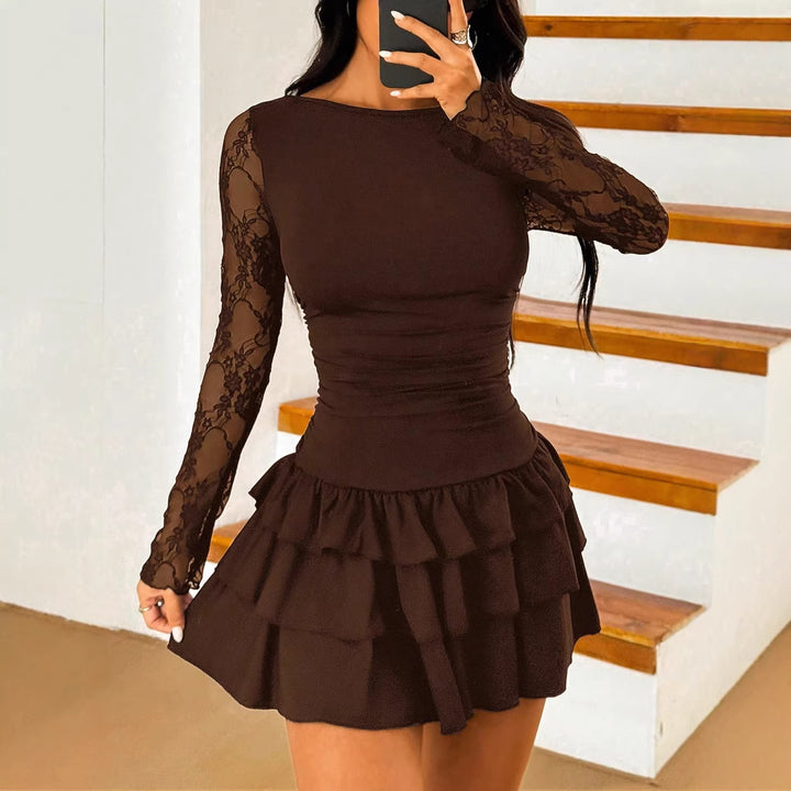 Women’s mini dress with transparent lace sleeves, gathering and tiered ruffles.