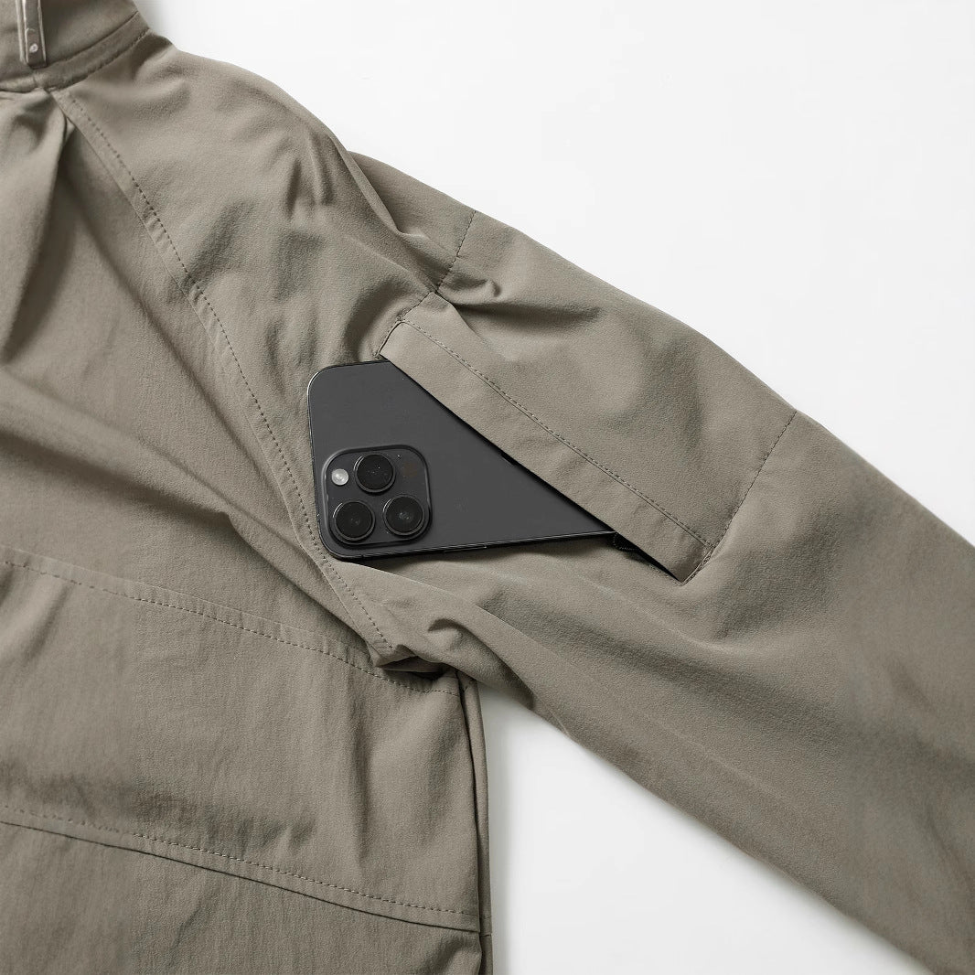 Men's tactical half-zip outdoor pullover with high standing collar, concealed zipper, and arm pockets Mune Fashion