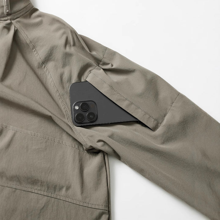 Men's tactical half-zip outdoor pullover with high standing collar, concealed zipper, and arm pockets Mune Fashion