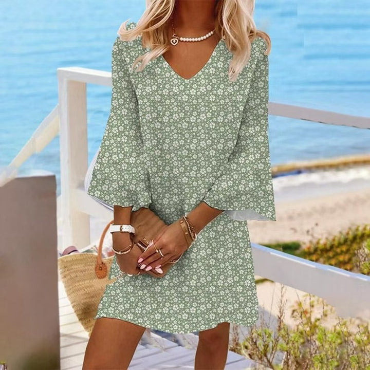 Women's light floral V-neck mini dress with bell sleeves and A-line cut Mune Fashion