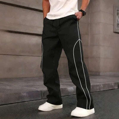 Men's sporty tapered training pants with elastic waistband, drawstring & contrast piping Mune Fashion