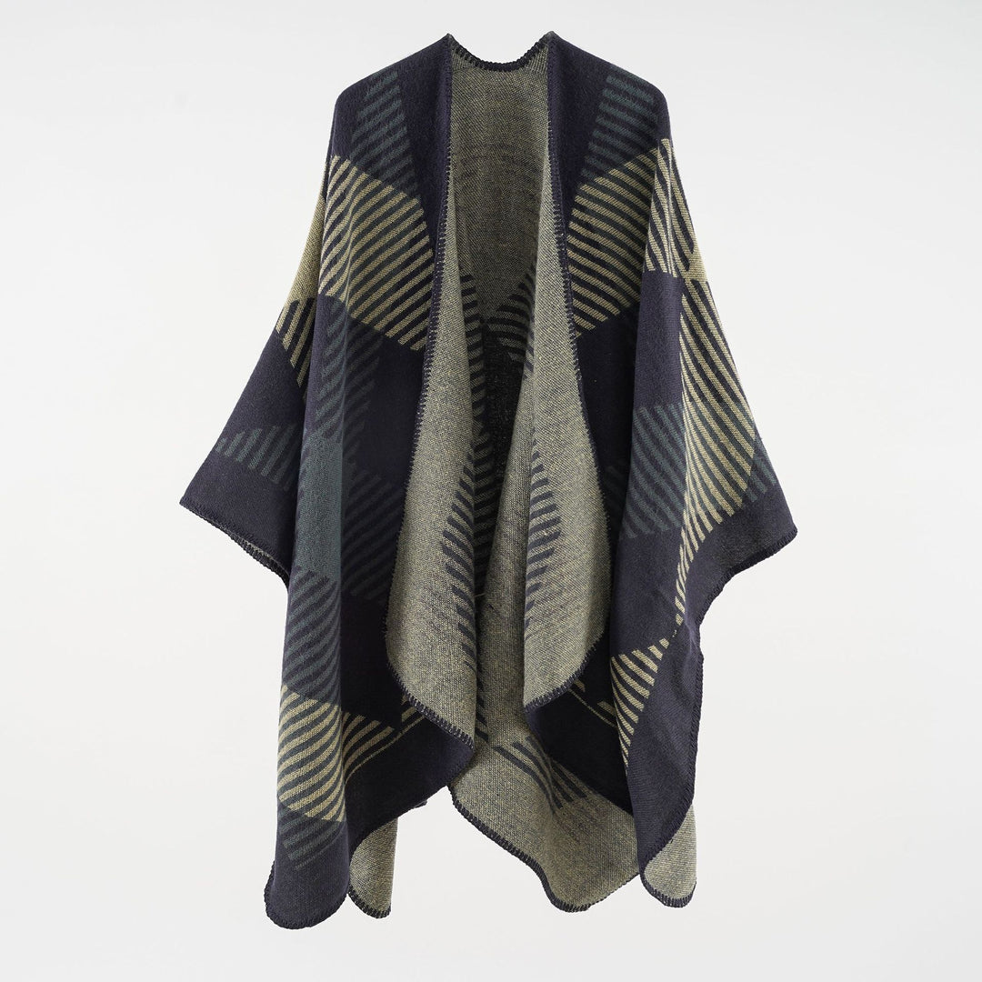 Women’s cape poncho made of wool blend with geometric striped jacquard and open edge seam Mune Fashion