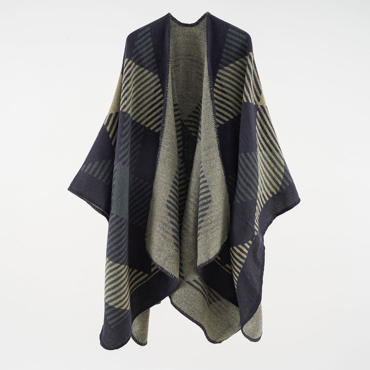 Women’s cape poncho made of wool blend with geometric striped jacquard and open edge seam Mune Fashion