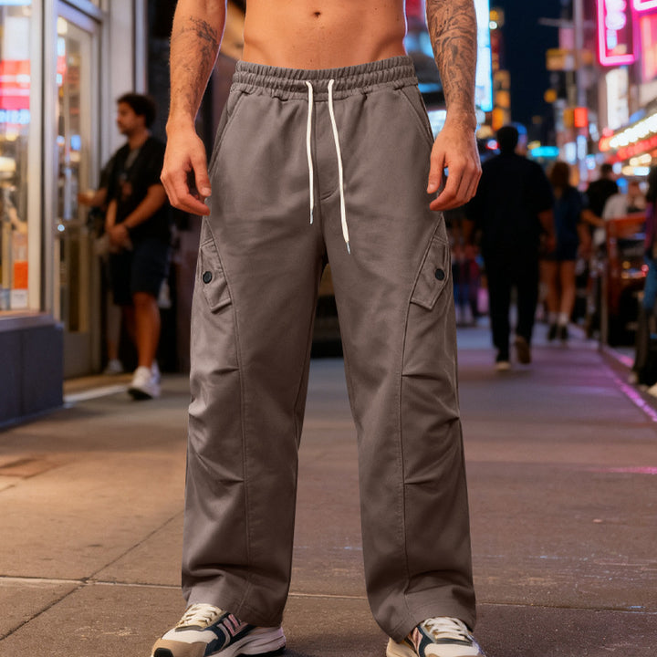 Men's wide cargo street pants with elastic drawstring waistband and functional flap pockets Mune Fashion