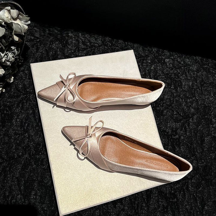 Ladies pointed satin ballerinas with bow detail and padded comfort insole Mune Fashion