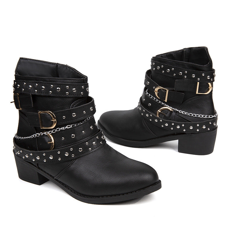 Women's ankle-height biker ankle boots with studded strap, chain and buckle details Mune Fashion