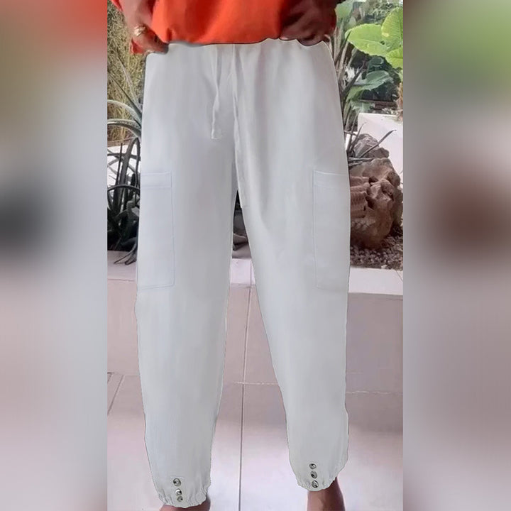 Ladies cargo jogging pants with drawstring, patch pockets and button cuffs Mune Fashion